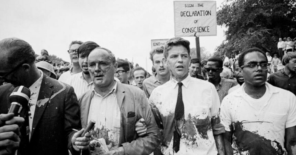 Staughton, second from the right, and fellow Vietnam War protesters in 1965, shortly after being doused with red paint outside the White House.