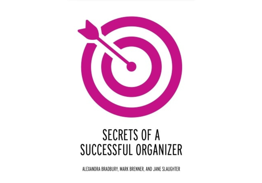 Cover illustration of Secrets of a Successful Organizer by Alexandra Bradbury, Mark Brenner, and Jane Slaughter. A red bullseye with an arrow on the target.