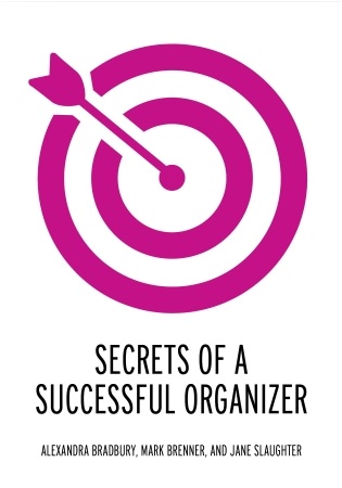 Cover illustration of Secrets of a Successful Organizer by Alexandra Bradbury, Mark Brenner, and Jane Slaughter. A red bullseye with an arrow on the target.