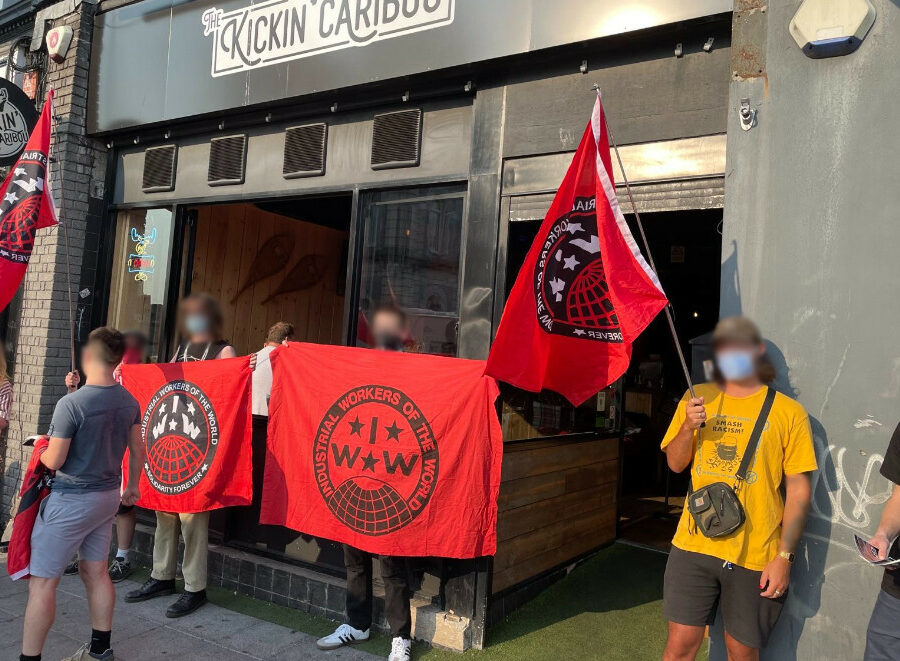 June 15, 2023. IWW picket at Kickin' Caribou in Plymouth, UK. Picture Source: https://iww.org.uk/news/plymouth-picket-wins-back-unpaid-wages/