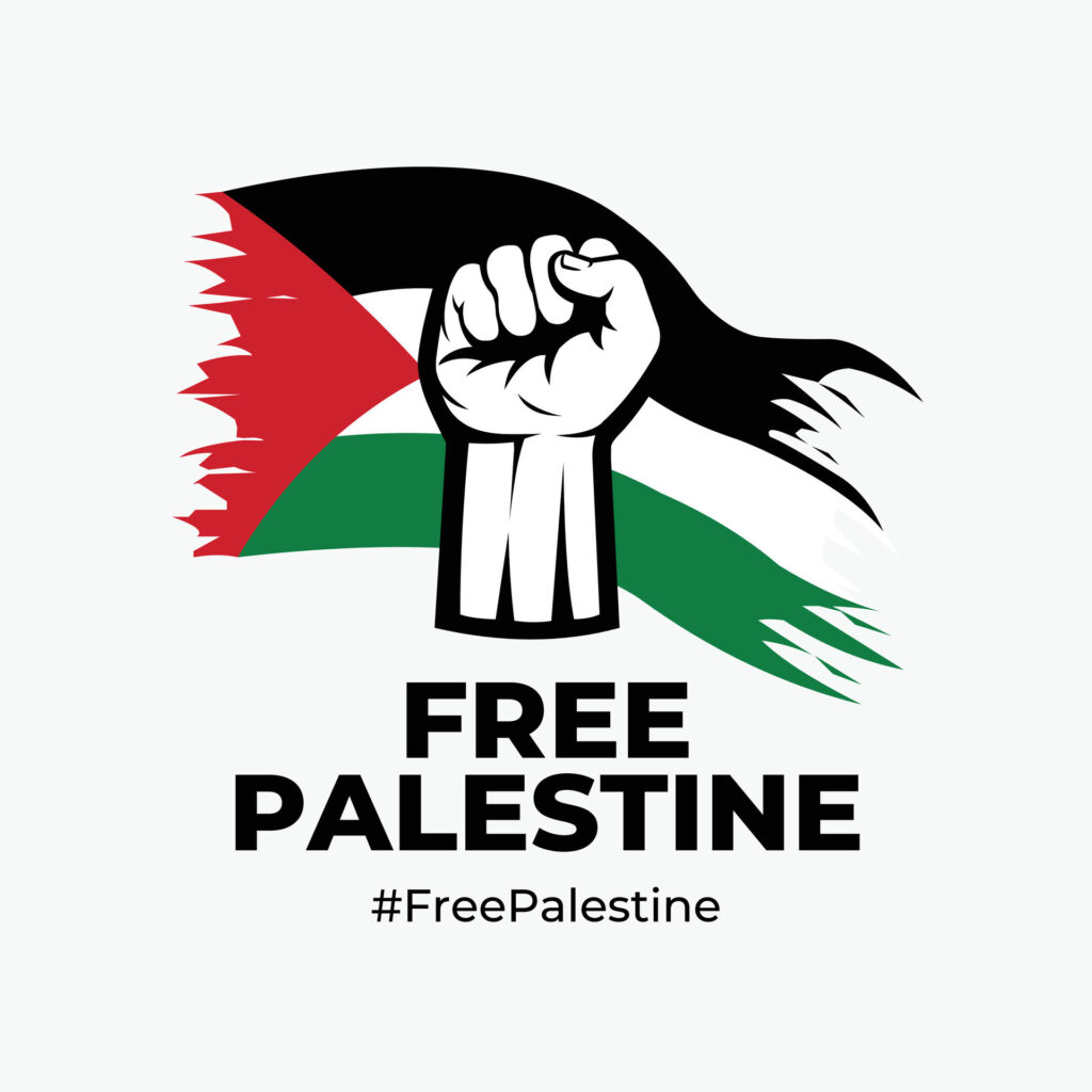 A solidarity fist in front of a flag of palestine with the text "Free Palestine" below it, and a hashtag with the words "FreePalestine."