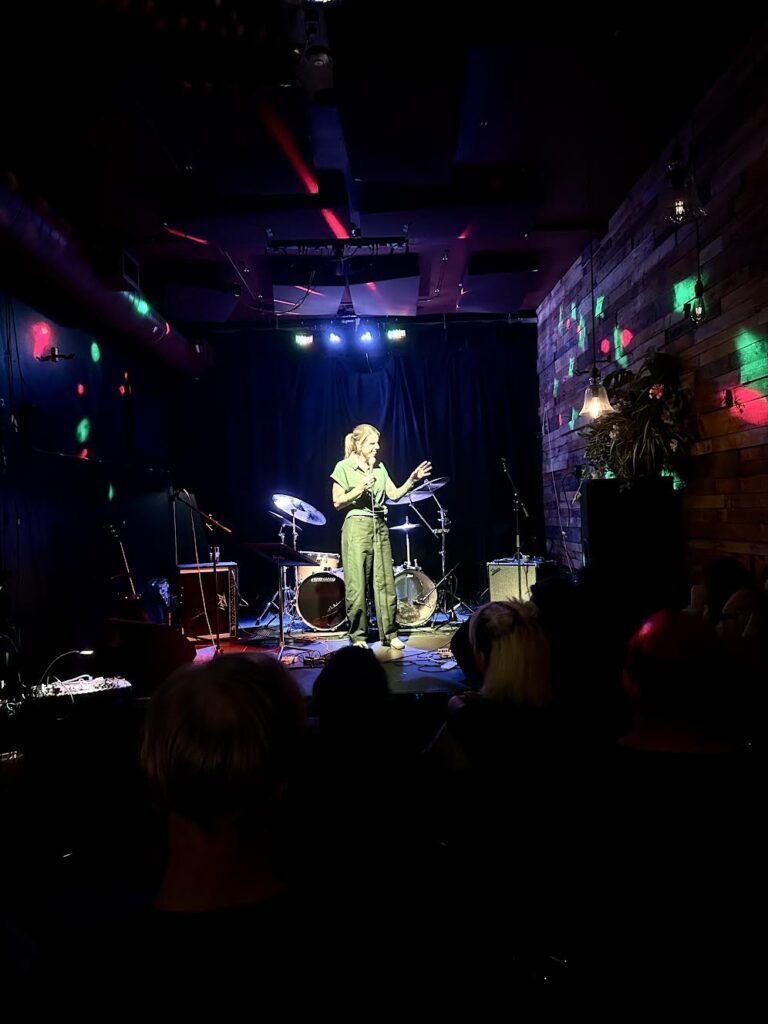 Comedian Bailey Pope performs at the IWW Social in Denver, CO.