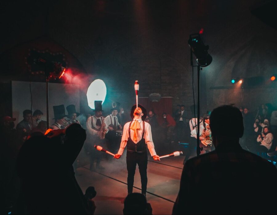 A juggler performs at a circus.